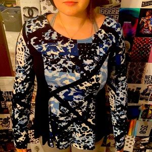 This is a Style and Company multi blueprint top
